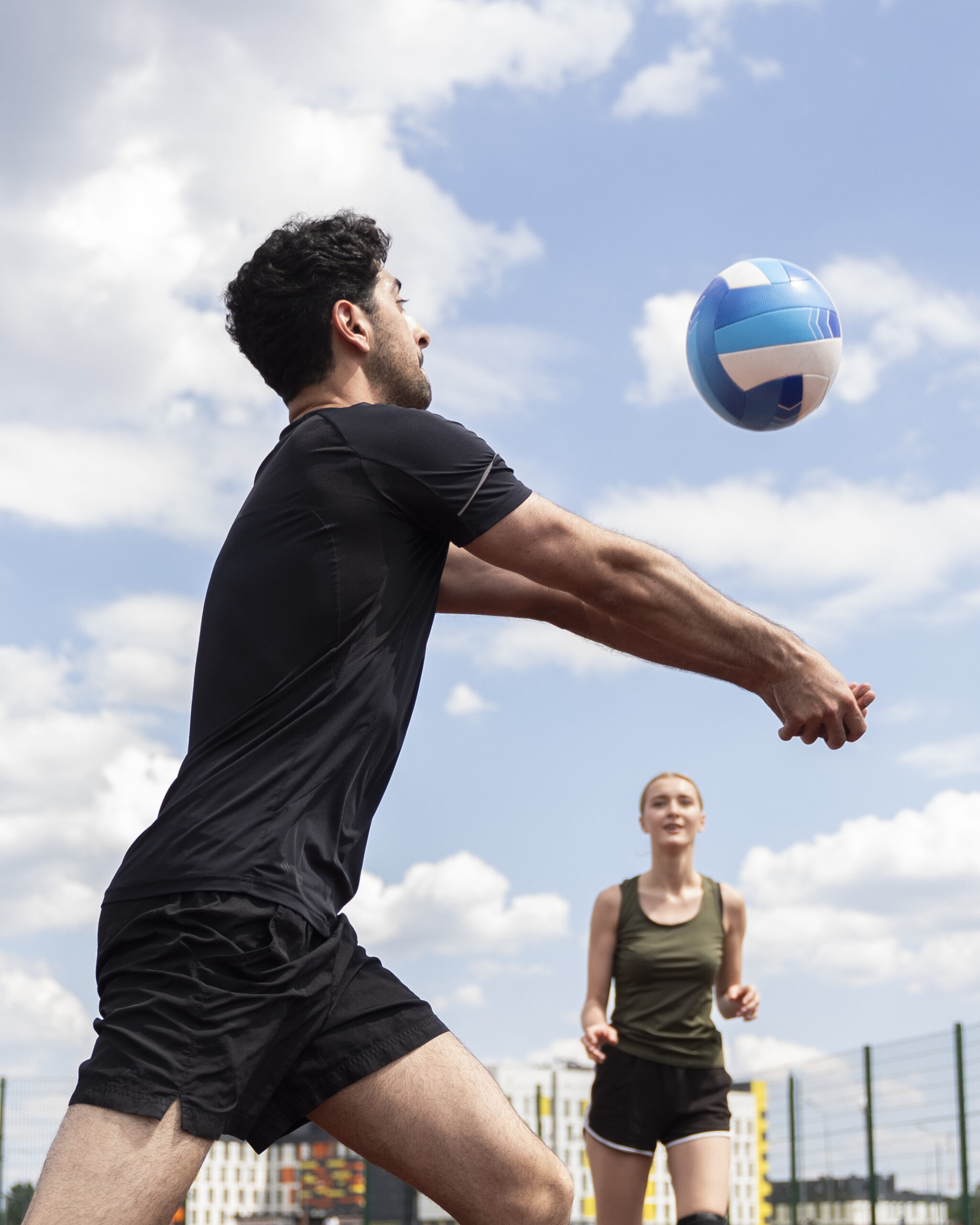 young volleyball man player court scaled